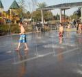 Children Playing in Splash Pad at Discovery Meadows Park