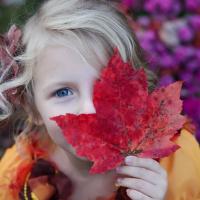 Girl with Fall Leaf