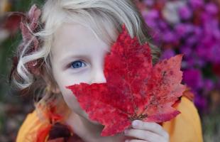 Girl with Fall Leaf