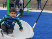 Child Playing on Inclusive and Accessible Play Structure at Jay Pearson Neighborhood Park