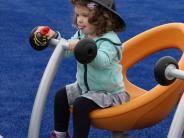 Child Playing on Inclusive and Accessible Play Structure at Jay Pearson Neighborhood Park