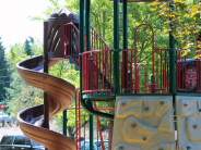 Lower City Park Play Structure with Rock Wall