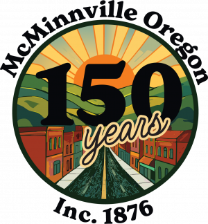 Mac150 Logo Circle with drawing of a downtown streetscape leading to a hilly sunset. The words McMinnville Oregon and Incorporated 1876.