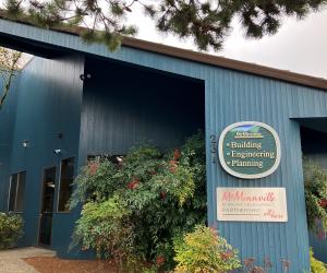 The Community Development Center The entrance of the Community Development Center. A sign says "Building, Engineering, Planning"