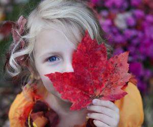 Girl with Fall Leaf